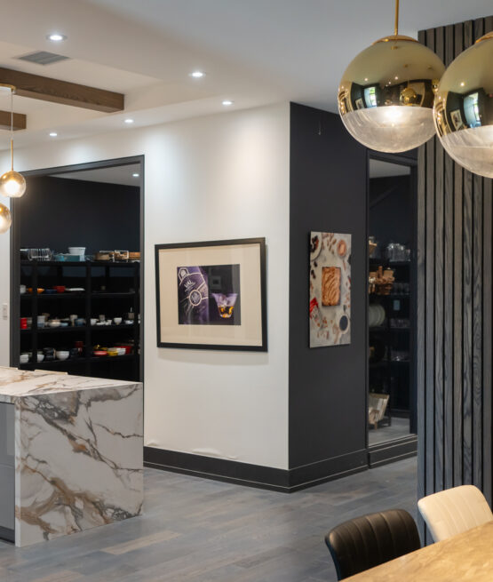 Client viewing lounge with live studio feed — Foodivine food photography studio Toronto