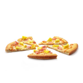 Pizza slices with ham and toppings on white background – food photography for restaurant menus Toronto